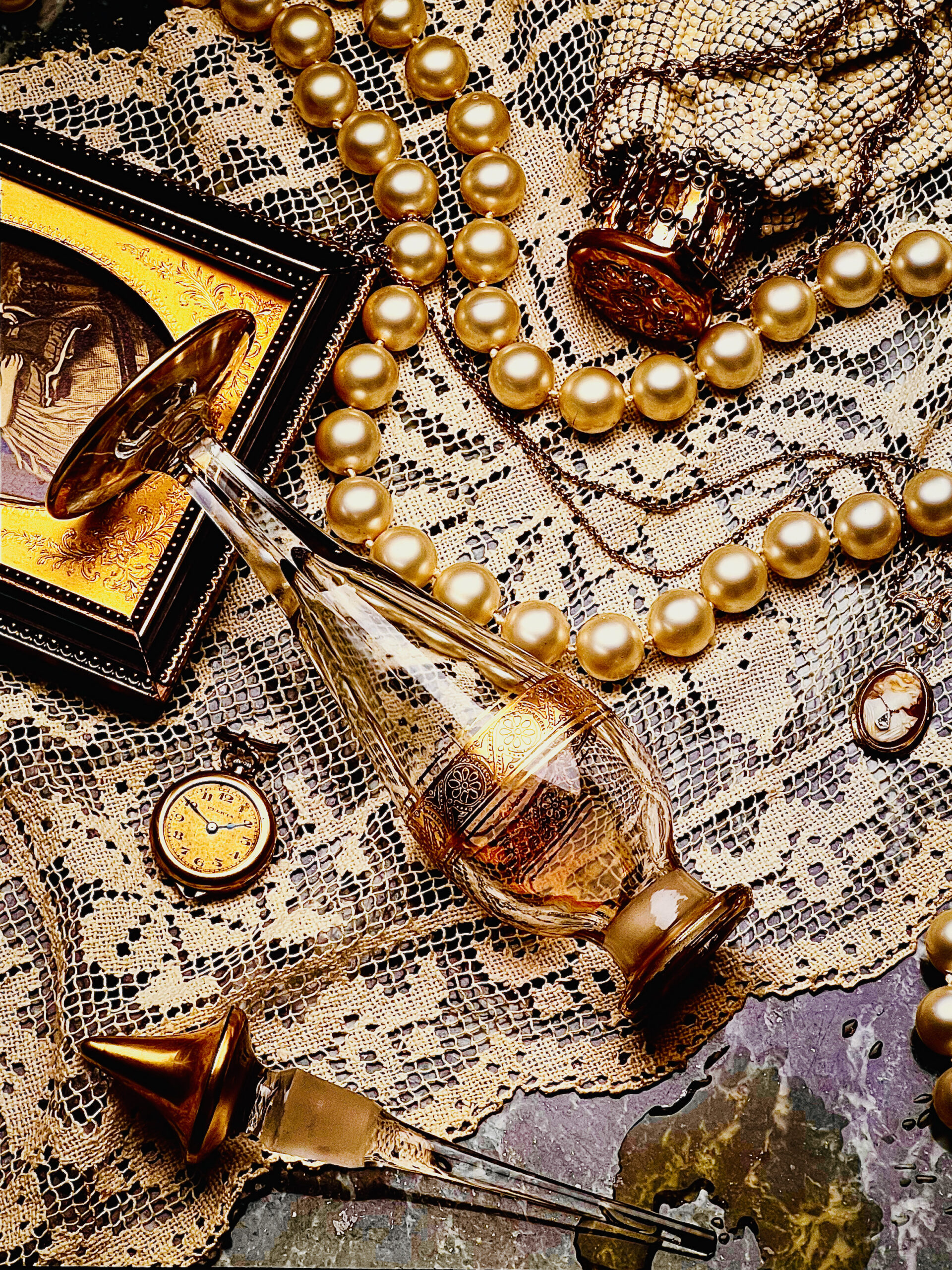 Spilled perfume and pearls